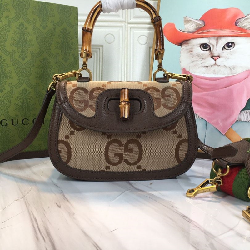 G*u*i top handle bags
